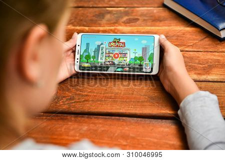 Stavropol, Russian Federation. July 5, 2019. A Man Holding A Smartphone On Which Opens A Mobile Appl