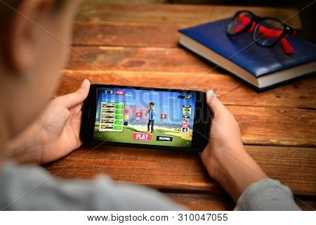 Stavropol, Russian Federation. July 5, 2019. A Man Holding A Smartphone On Which Opens A Mobile Appl