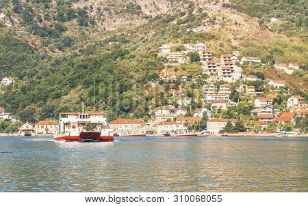 View Of The Kamenari - Lepetani Ferry Service In The Bay Of Kotor, Montenegro.