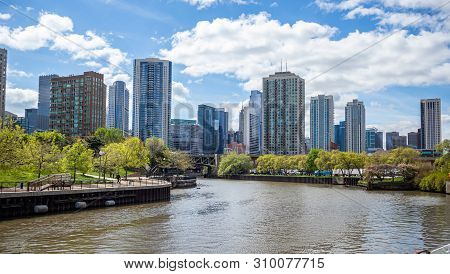 Chicago City Skyscrapers On The River Canal, Blue Sky Background