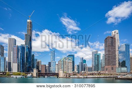 Chicago City Skyscrapers On The River Canal, Blue Sky Background