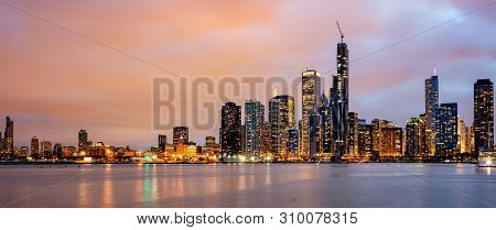 Panoramic View Of Chicago City High Rise Buildings Cloudy Sky In The Evening