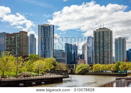 Chicago City Skyscrapers On The River Canal, Blue Sky Background