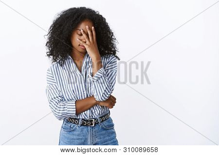 Tired Snobbish Good-looking Stylish African American Curly-haired Woman Facepalm Close Eyes Bothered