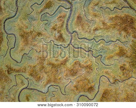 Aerial Top Down View Of Tidal Marshland With Natural Meandering Drainage System In Verdronken Land V