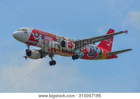Airplane Landing At Singapore Airport