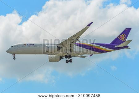 Airplane Landing At Singapore Airport