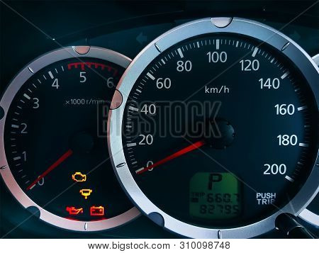Close-up Car Console With Metric Unit System Speedometer