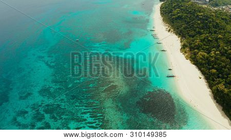 Travel Concept: Sand Beach With Tourists And Turquoise Water On Boracay, Philippines, Aerial Drone. 