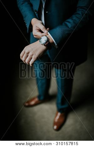 A Business Man In A Suit Waiting