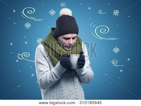 Young hipster frozen boy with doodled snowflakes and windy concept