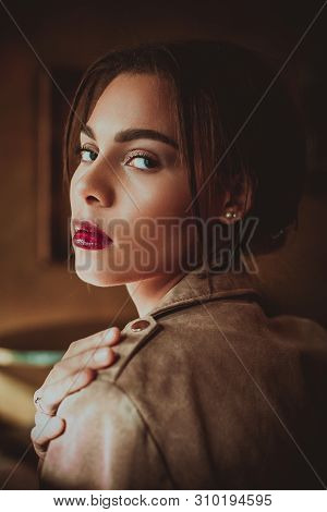 Portrait Of Beautiful Young Woman Mixed Race Wearing Suede Jacket. Fashion Photoshoot.