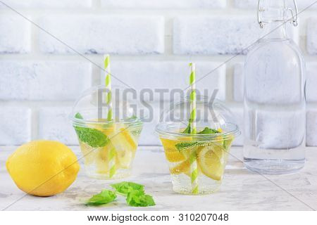 Glass Of Fresh Cool Vitamin Water With Lemon Mint. Detox And Weight Loss Beverage. Sassy Healthy Org