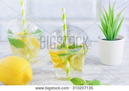 Cool Detox Water With Lemon Slice And Mint Leaf. Natural Weight Loss Beverage. Fresh Organic Lemonad
