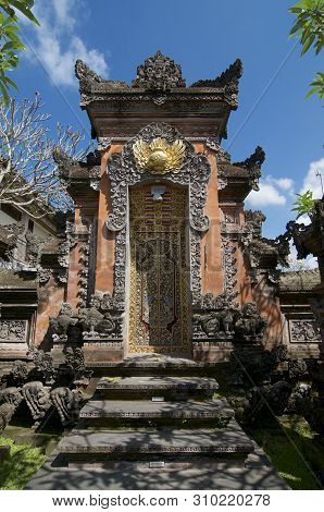 View Of A Typical Beautiful Decorated Balinese Entrance Gate To A House Located In Jalan Bisma Road 