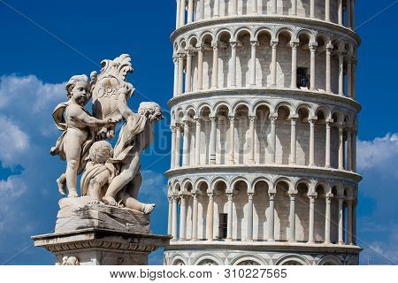 Fontana Dei Putti And The Leaning Tower Of Pisa