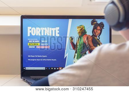 Vilnius, Lithuania - July 2, 2019: Boy Playing Fortnite Game. Fortnite Is Online Video Game Develope