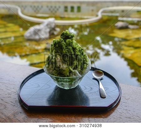 Traditional Japanese Sweet Dessert With Zen Garden Background.