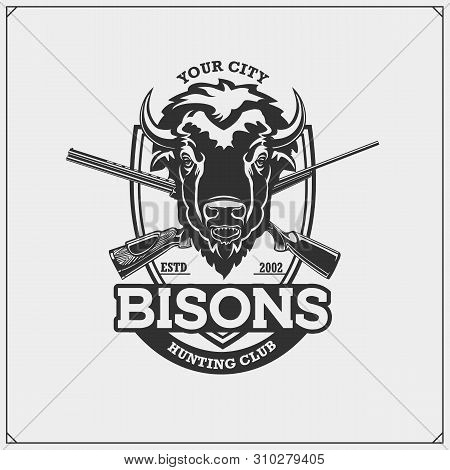 Hunting Club Emblem With Bison And Crossed Rifles.