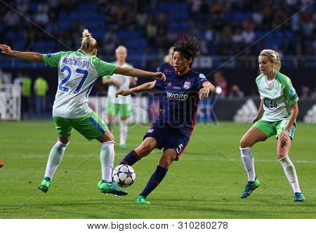 Kyiv, Ukraine - May 24, 2018: Saki Kumagai Of Olympique Lyonnais (c) Fights For A Ball With Isabel K
