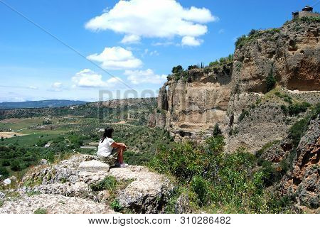 Ronda, Spain - May 13, 2008 - View Of The Gorge Featuring The Cauldron Handle With A Woman Looking A