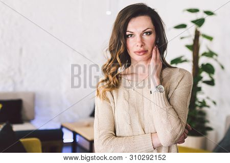 Good Looking Mid Aged Woman Portrait At Home. Elegant Business Woman. Middle-aged Woman Standing In 
