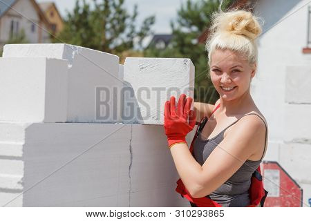 Woman Working With Airbricks