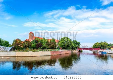 Wroclaw, Poland Panorama Of Ostrow Tumski Island, Odra Or Oder River And Red Bridge