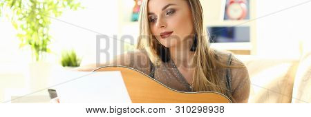 Home Guitar Playing Lesson Girl Hold Instrument. Beautiful Woman At Musical Training. Blonde With Ma