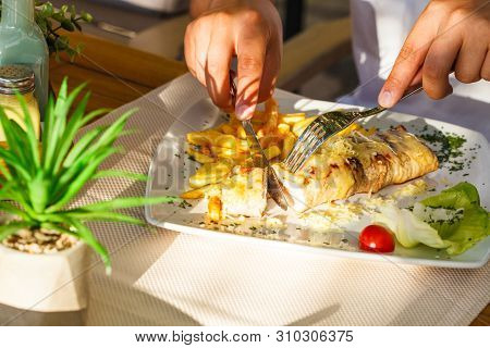 Traditional Montenegrin Meat Negush Steak On A White Plate In A Restaurant.