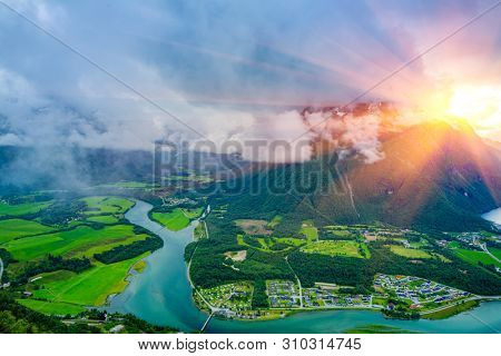 Aerial view on Andalsnes At Sunsise Over Mountain, Norway,  Mountain Landscape and Fjord View, Rauma, Romsdal, Norway. 