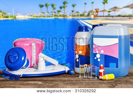 Equipment With Chemical Cleaning Products And Tools For The Maintenance Of The Swimming Pool.