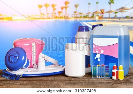 Equipment With Chemical Cleaning Products And Tools For The Maintenance Of The Swimming Pool.