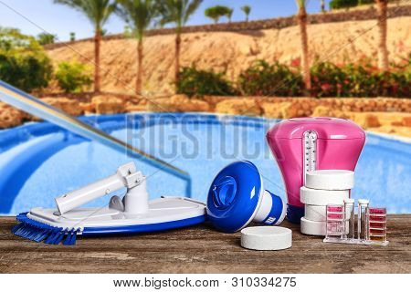 Equipment With Chemical Cleaning Products And Tools For The Maintenance Of The Swimming Pool.