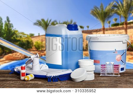 Equipment With Chemical Cleaning Products And Tools For The Maintenance Of The Swimming Pool.