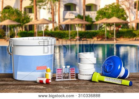 Equipment With Chemical Cleaning Products And Tools For The Maintenance Of The Swimming Pool.