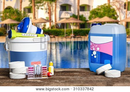 Equipment With Chemical Cleaning Products And Tools For The Maintenance Of The Swimming Pool.