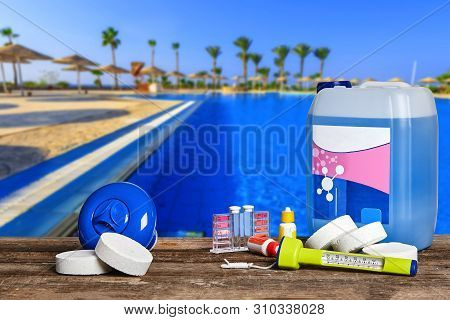 Equipment With Chemical Cleaning Products And Tools For The Maintenance Of The Swimming Pool.