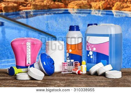 Equipment With Chemical Cleaning Products And Tools For The Maintenance Of The Swimming Pool.