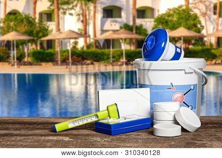 Equipment With Chemical Cleaning Products And Tools For The Maintenance Of The Swimming Pool.