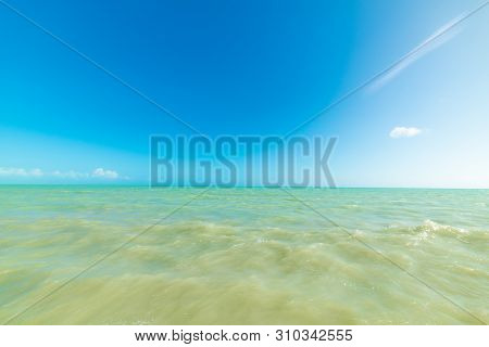 Turquoise Water And Blue Sea In Higgs Beach In Key West, Usa