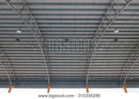 Steel Roof Structure. Moonlight Bulb. Steel Structure With Roof Tiles. Architectural Structure Of Ro