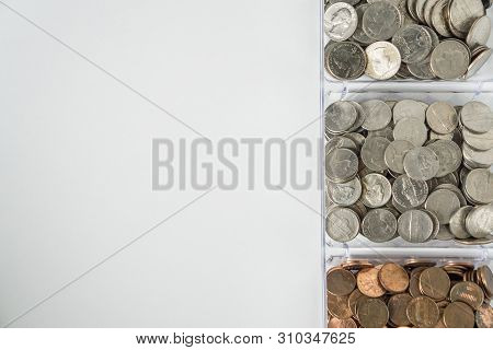Organized Loose Coin Change On Right Side, Blank Empty Room Space For Text Left