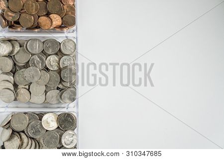 Organized Loose Coin Change On Left Side, Blank Empty Room Space For Text Right