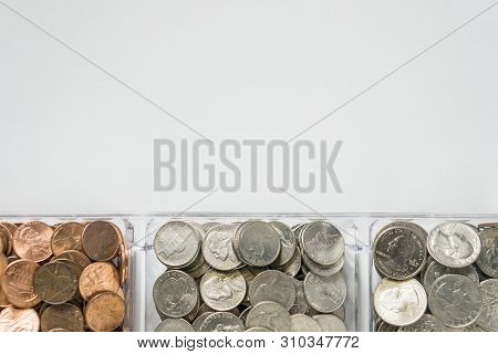 Organized Loose Coin Change On Bottom Side, Blank Empty Room Space For Text Top
