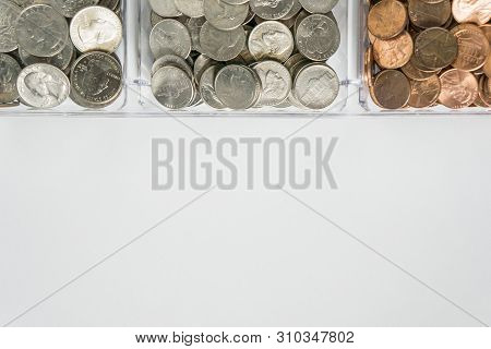 Organized Loose Coin Change On Top Side, Blank Empty Room Space For Text Bottom