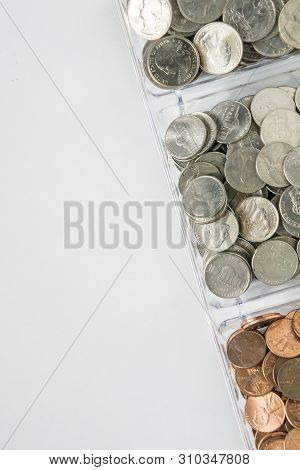 Organized Loose Coin Change On Right Side, Blank Empty Room Space For Text Left