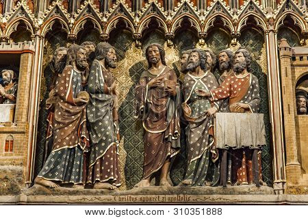 Paris, France - June 16, 2017: Carved Wall With Apparition To The Apostles In The Upper Room At Cath