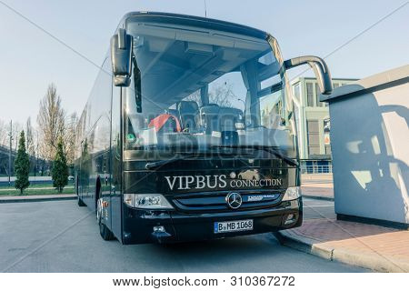 RUSSIA, KALININGRAD KOENIGSBERG -APRIL 13, 2019 : Modern Black Passenger Bus on the Parking Lot