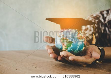 Education In Global World, Graduation Cap On Businessman Holding Earth Globe Model Map With Radar Ba